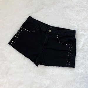 Mid rise studded denim shorts